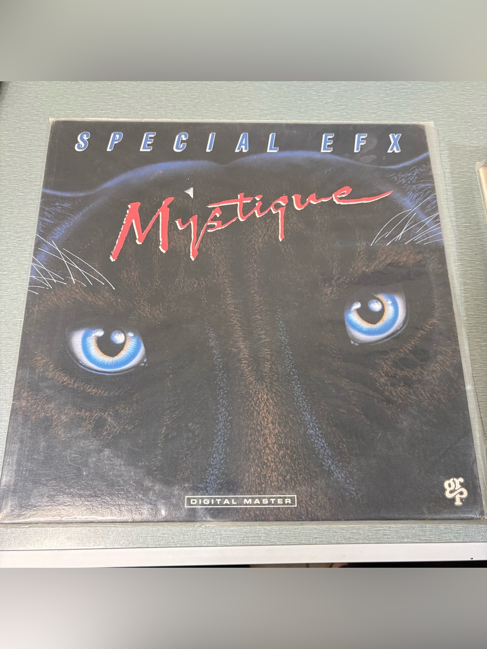Mystique Cat Toy Mat by - Black with Blue Eyes